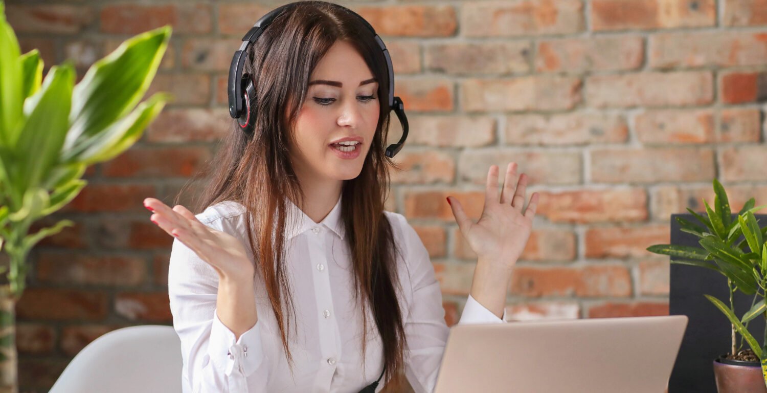woman on an online call while working on her laptop