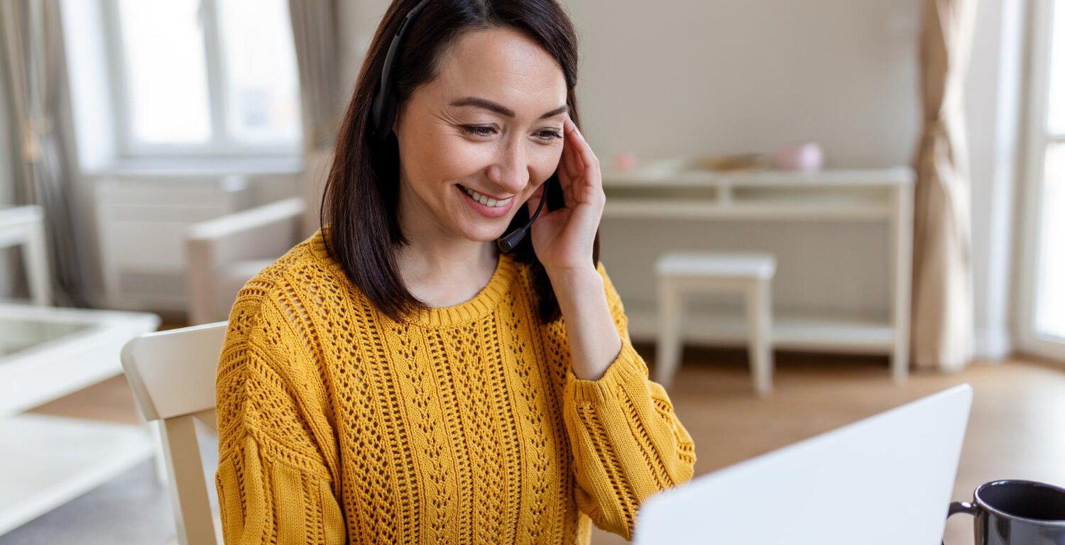 woman teaching through a video conference call